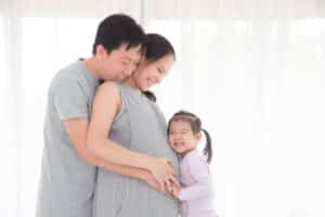 asian pregnant family