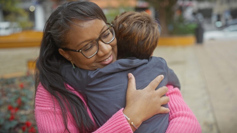 Mother signing guardianship documents for minor child in New York