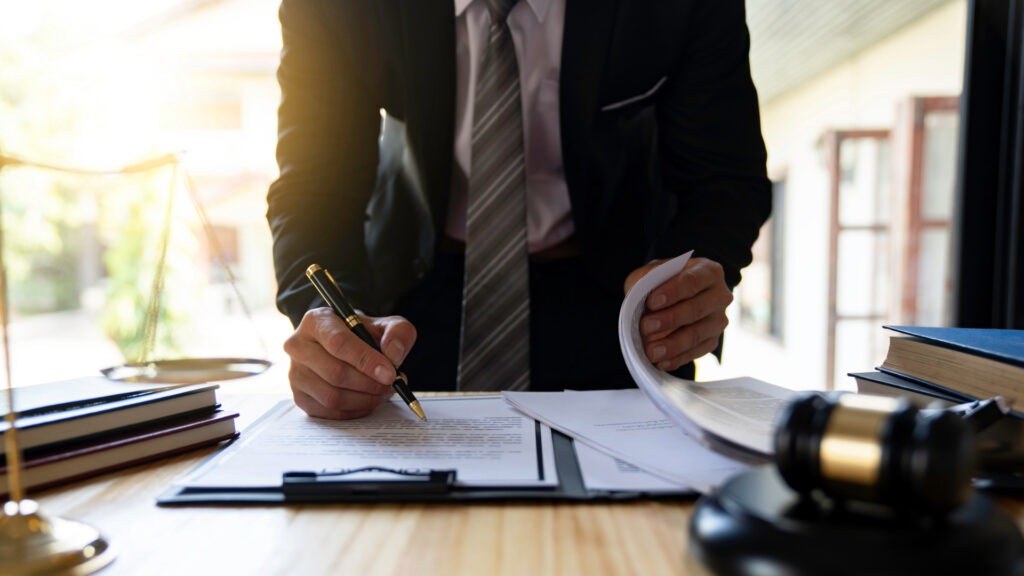 Attorney reviewing legal documents with NYC client