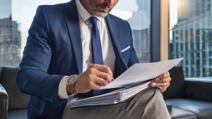 Estate planning attorney reviewing beneficiary forms in NYC