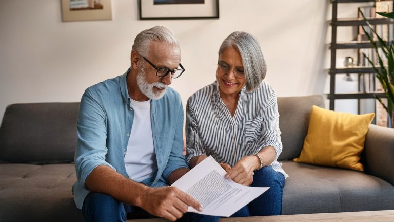 Senior couple reviewing estate planning documents in Brooklyn
