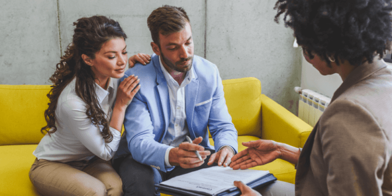 Attorney reviewing executor documents with New York clients